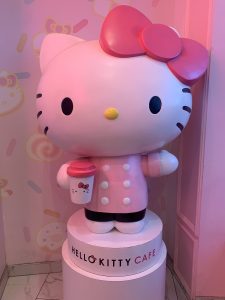 Learn to Love Bright Pink & Neon Signs at the Hello Kitty Grand Café ...