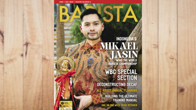 The June + July 2024 issue of Barista Magazine featuring Mikael Jasin on a wooden table.