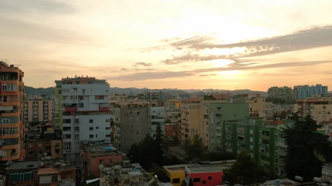Cloudy sunrise over the colorful city of Tirana.