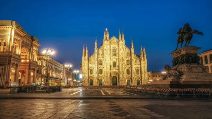 View of a cathedral in a city square.