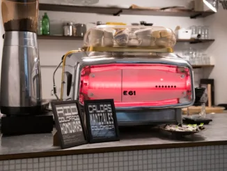 Pressato's bright red espresso machine.