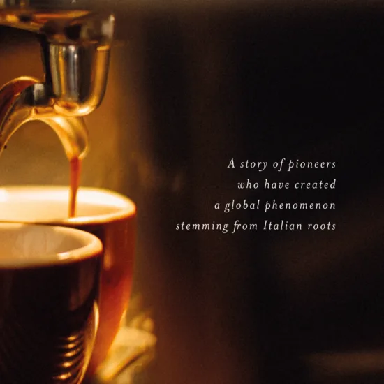 Photo of espresso being pulled into espresso cups on a machine. It is capptioned: A story of pioneers who have created a global phenomenon stemming from Italian roots.