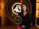 Julia Engel poses with her Licor 43 Bartender & Barista Challenge trophy.