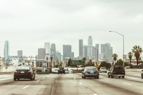 Cars driving into Los Angeles' city center.