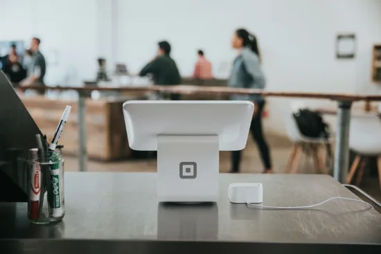 A Square register setup in a shop.