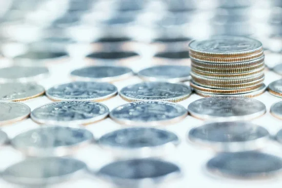 Stack of quarter dollars.